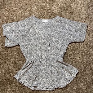 Speckled blouse with cute button detail!